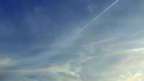 Beautiful Sky with Clouds and Contrail