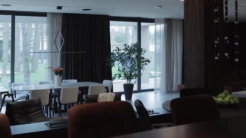 It is a Modern Dining Area Characterized By an Elegant Design and Plenty of Natural Light