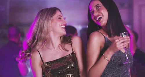 Young Women Dancing at a Nightclub Party
