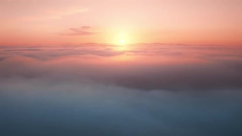 Golden Sunrise Above a Dreamy Cloudscape