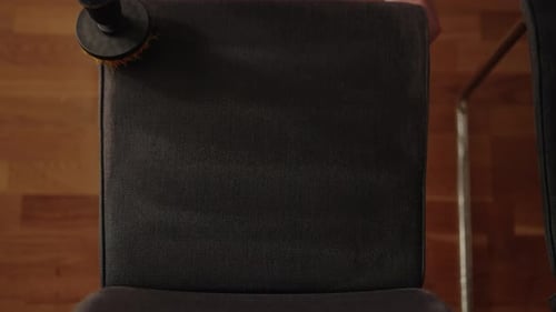 Top View of Unrecognizable Housewife Using Cordless Screwdriver with Rotating Brush Attachment