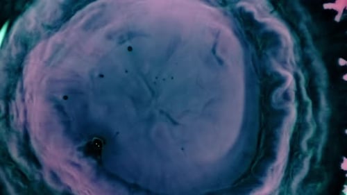ink diffusion in water showing fluid color blending in dreamy slow motion