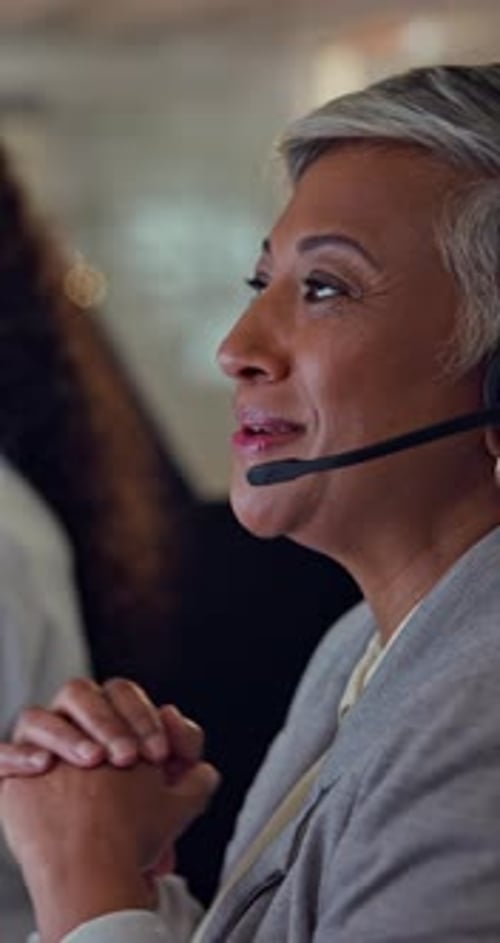 Mature woman, call center and help desk in office, night shift and telemarketing agent