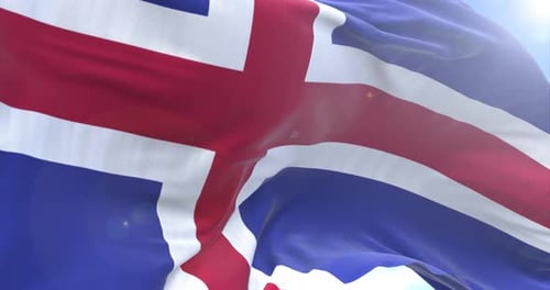 Realistic Iceland Flag Waving Against Blue Sky