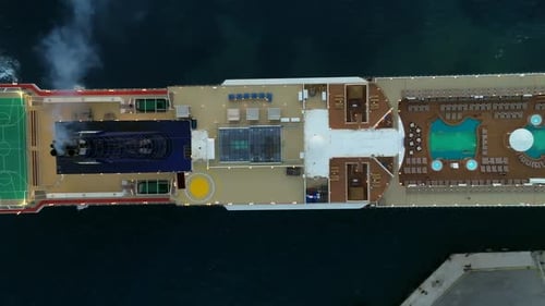 Mega Cruise ship colorful upper deck with swimming pool
