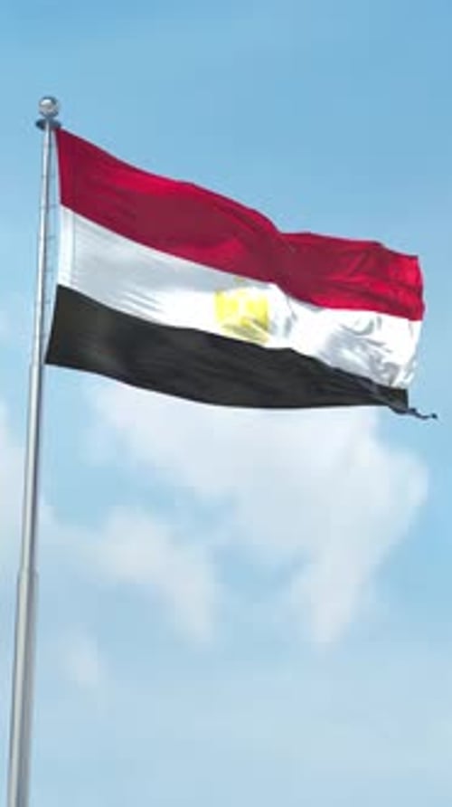 Waving Egypt National Flag Against Blue Sky