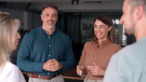 Diverse Business Team People Discussing Work Standing in Office