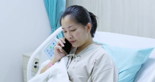 Patient phone call hospital room emotional moment calm environment close-up view personal connection