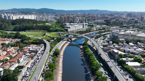 Cityscape of rush traffic jam at freeway road. Transportation scenery.