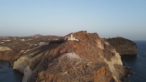 Aerial shot of Akrotiri lighthouse, Santorini, Greece