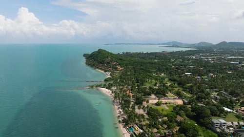 Tropical Coastline with White Sandy Beaches and Green Hills Ko Samui Thailand