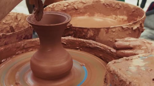 Shaping A Clay Pot In A Ceramics Workshop 09