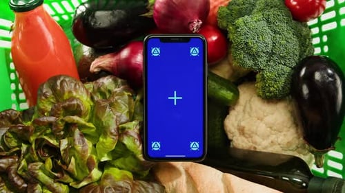 Food Shopping Delivery Online Shop Application Smartphone with Blue Chroma Key Screen and Fresh