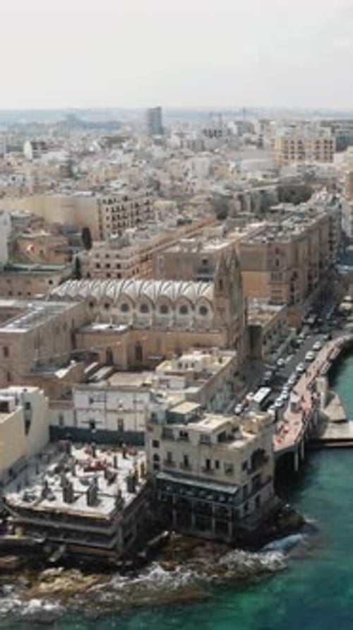 Church of Our Lady of Mount Carmel dominating the cityscape of Balluta Bay, Malta