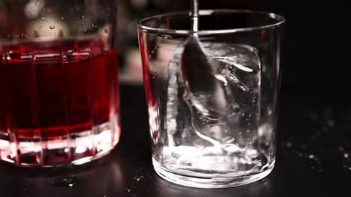 the bartender prepares a cocktail at the bar