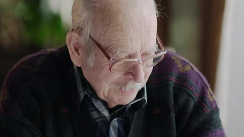 Portrait of Senior Mature Old Man on His 70s Looking Sad and Worried Suffering Pain and Depression