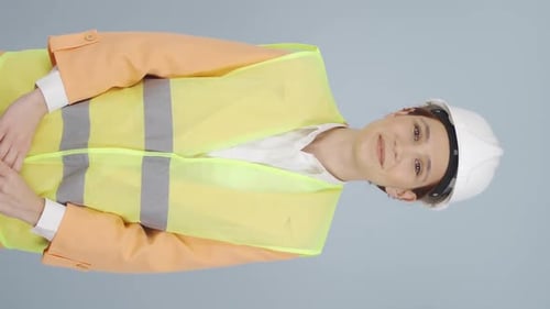 Vertical video of Engineer nodding to the camera.