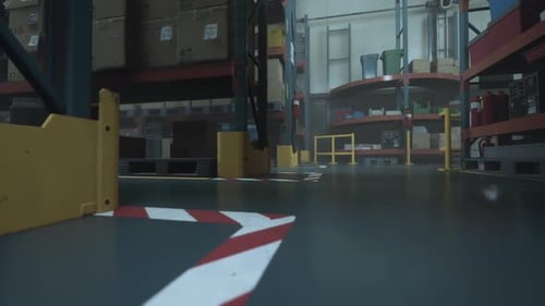 Large Warehouse With Red and White Arrow