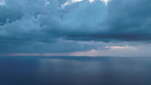 Dramatic Color of the Sea Waves Crashing Against the Rocks Aerial View on a Wild Beach