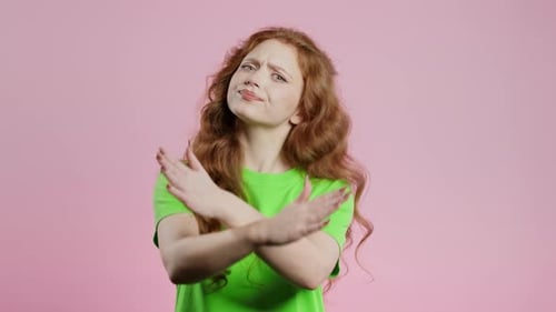 No Never Pretty Red Haired Woman Disliking and Rejecting Gesture By Stop Crossing Hands Sign Cute