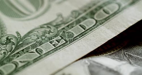 a close-up of a one dollar bill bank note of the United States of America.