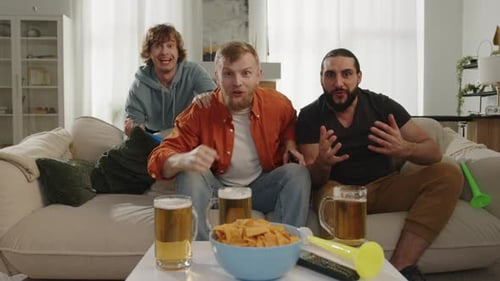 Nervous Friends Football Fans Watching Match on Tv at Home Cheering for Their Favorite Team
