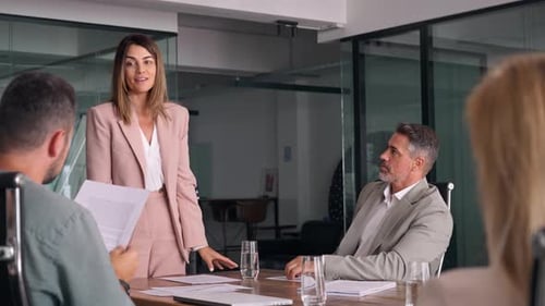 Business Executive Team Having Discussion at Office Meeting