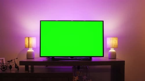 LcD Smart TV Screen with a Blank Green Background in the Living Room Chroma Key Screen for