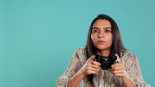 Upset Woman Showing Thumbs Down Sign Gesturing Holding Controller