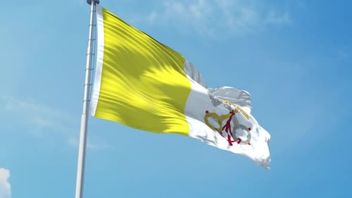 Waving Vatican City Flag Against Clear Blue Sky