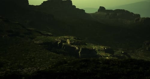 Mountain Landscape at Dusk with Serene Lighting and Rugged Terrain