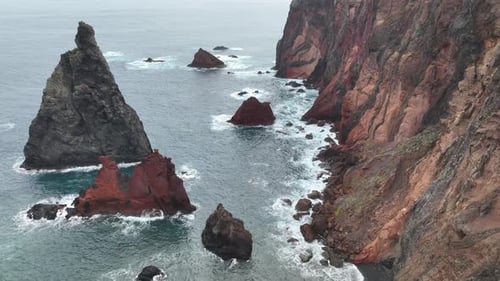 Aerial view of rugged cliffs and coastline, Portugal.