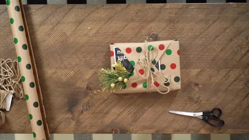 Gift Preparation on Wooden Table