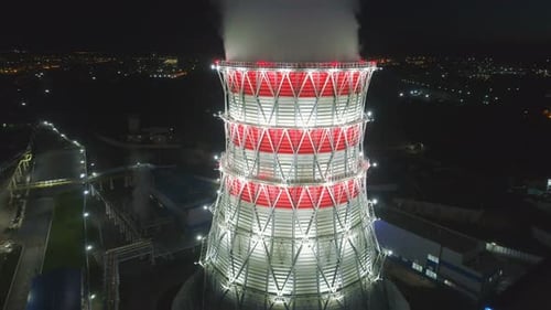 Aerial View Cooling Tower in Metal Carcass with White Steam