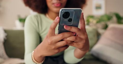 Young Adult Holding Smartphone Indoors