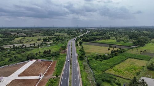 Indian highway amidst scenic rural surroundings