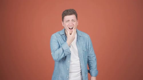 Man with toothache.