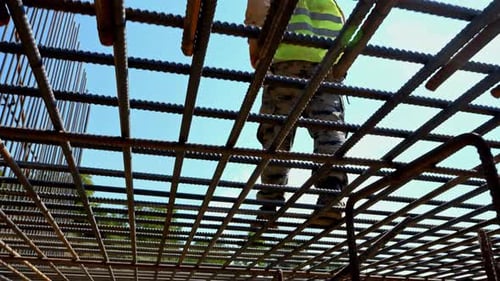 Worker walking on construction site