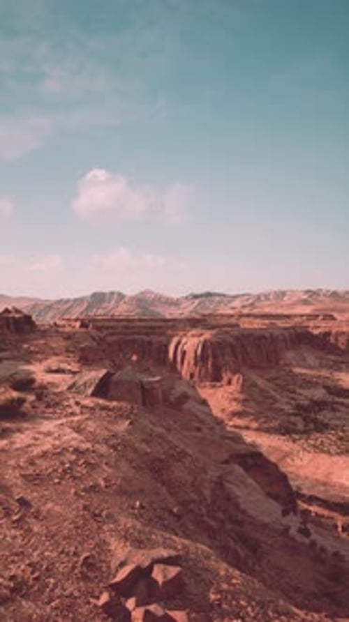Arid Desert Landscape With Rocks and Dirt
