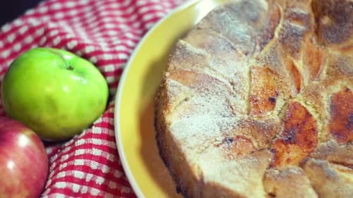 Delicious apple pie sprinkled with powdered sugar
