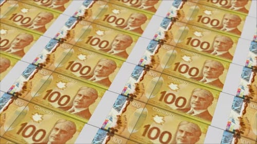 100 CANADIAN DOLLAR banknotes printing by a money press