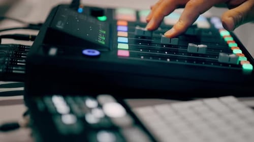 Audio Mixer Fader Control in Music Production Studio