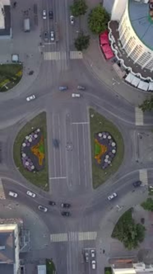 An Aerial View of a Beautiful Urban Roundabout Surrounded By Lush and Vibrant Greenery Stock Clip