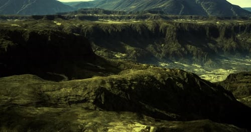 Rugged Mountain Landscape with Green Hues in Daylight