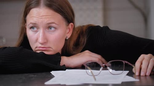 Exhausted office clerk sleeping at workplace