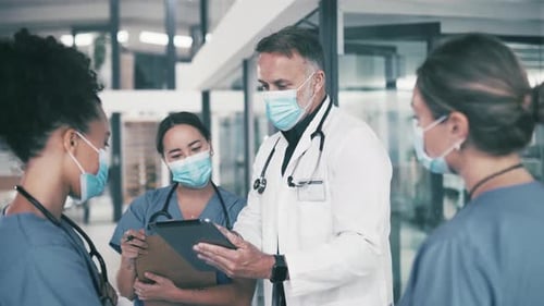 Man, doctor and tablet with mask for coaching nurses, interns or medical team at hospital