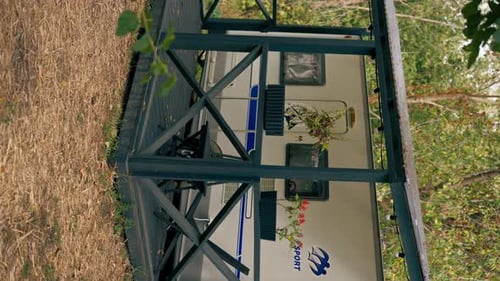 vertical video A mobile home with a terrace is located in country glamping site for relaxation