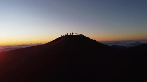 Aerial video of Mount Pulag at sunset with people in the background, the third highest mountain