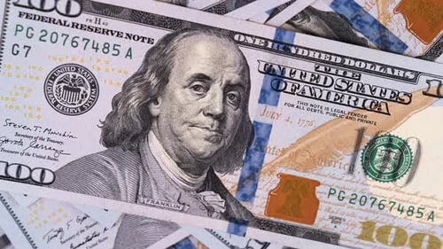 American one dollar paper money pile on desk rotate, close up. US President on United States.