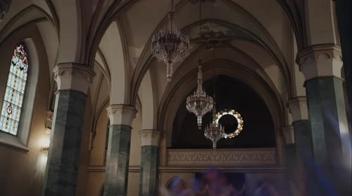 Ornate Arches and Chandeliers in Building Interior